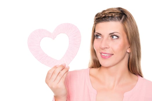 Portrait of a young woman with a pink heart against a white background