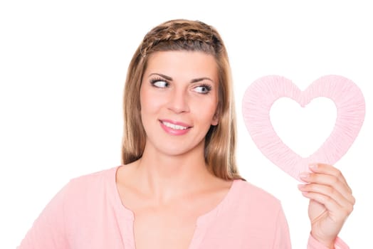 Portrait of a young woman with a pink heart against a white background