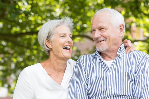 Active senior couple in a park