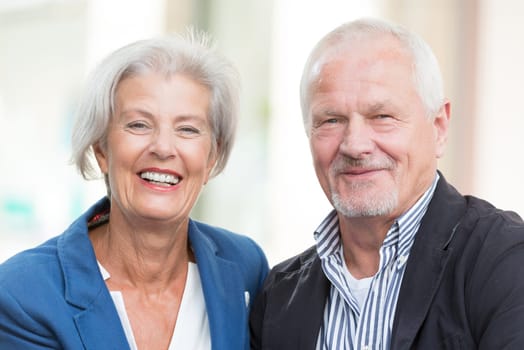 Active senior couple against an urban background