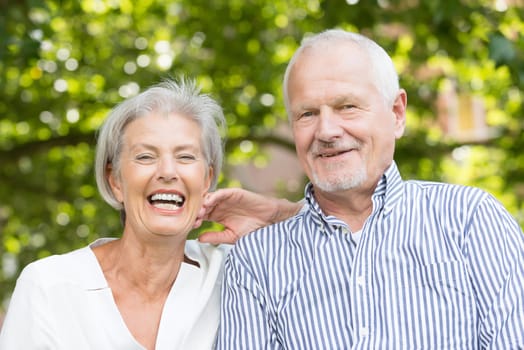 Active senior couple in a park