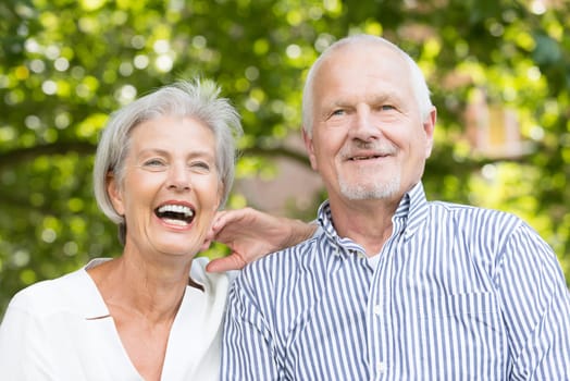 Active senior couple in a park
