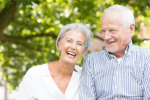 Active senior couple in a park