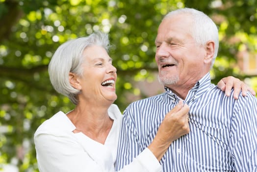 Active senior couple in a park