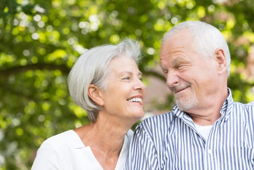 Active senior couple in a park