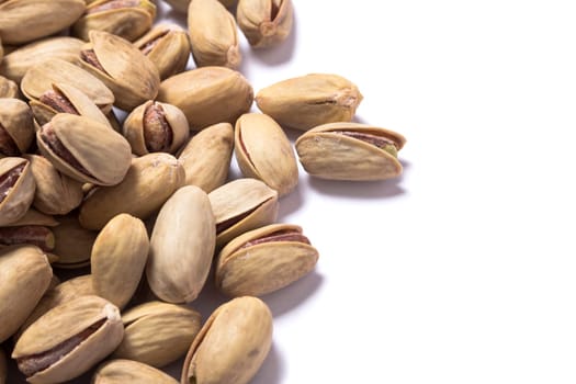 Pistachio nuts, fruits isolated on white background
