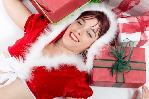 a portrait of beautiful  girl wearing santa claus clothes