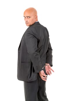 Businessman in handcuffs isolated in white background