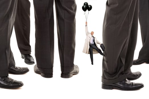 Small businessman trying to reach big business players