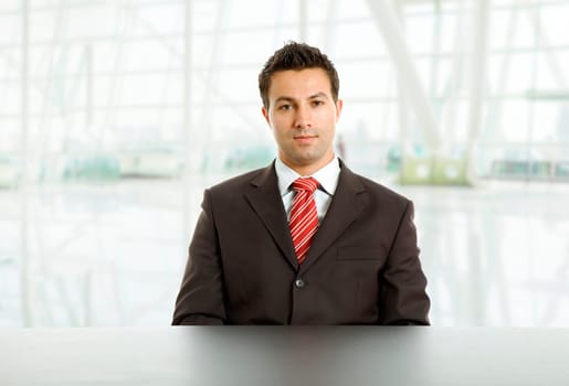 young business man on a desk, at the office