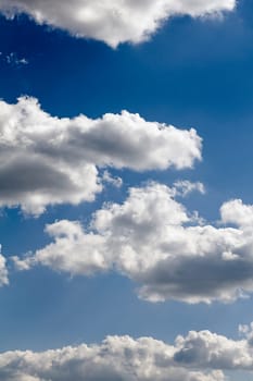 clouds in the sky drifting away in a light breeze
