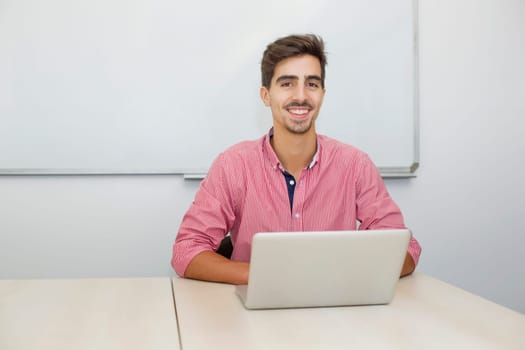 young casual teenager student in the classroom