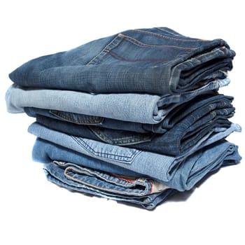 Blue jeans folded and stacked in a pile