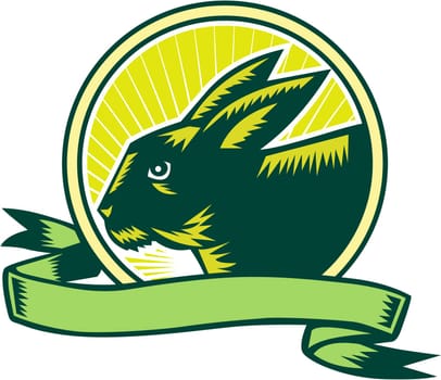 Illustration of a bunny head viewed from the side set inside circle and ribbon with sunburst in the background done in retro woodcut style.