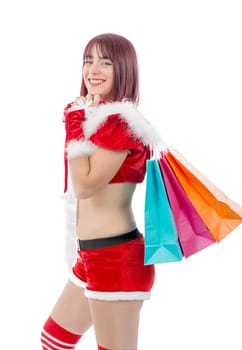 a beautiful Santa Claus woman holding shopping bags