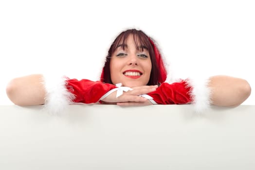 a portrait of beautiful girl wearing santa claus clothes