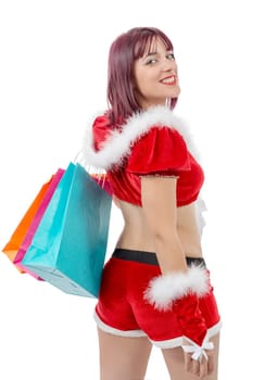 a beautiful Santa Claus woman holding shopping bags