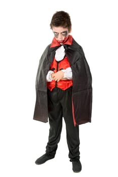 Boy with face-paint and vampire Halloween costume isolated in white