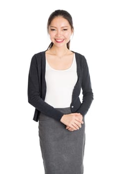 Portrait of young Asian girl smiling, isolated on white background.