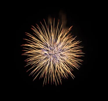 Yellow fireworks on night sky background