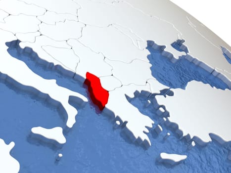 Map of Albania on globe with metallic land and realistic water. 3D illustration