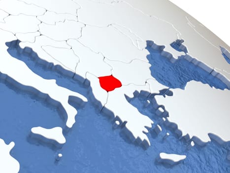 Map of Macedonia on globe with metallic land and realistic water. 3D illustration
