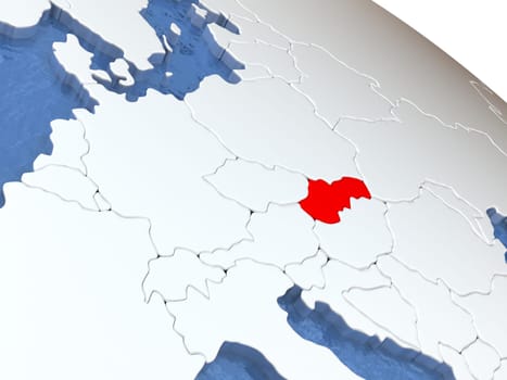 Map of Slovakia on globe with metallic land and realistic water. 3D illustration