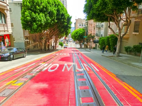 San Francisco, California, United States of America - May 04, 2016: typical San Francisco street with cable car tracks, California