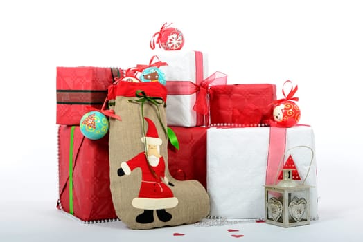 the Christmas gift boxes with boot of Santa Claus