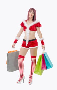 a beautiful Santa Claus woman holding shopping bags