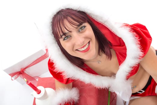 christmas. portrait of beautiful  girl wearing santa claus clothes