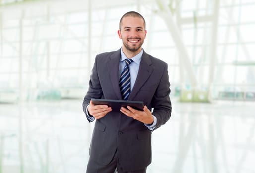 young businessman with a tablet pc, at the office