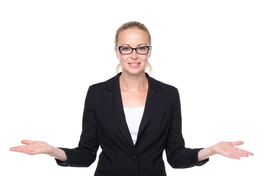 Beautiful young businesswoman smiling, holding open palms with empty copy space. Business woman showing hands sign to sides, concept of advertisement or comparing products. White background.