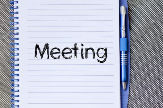 Meeting text concept write on notebook