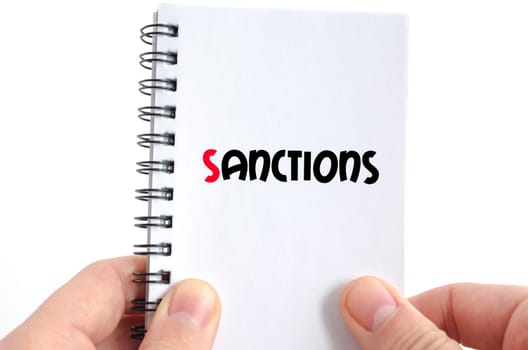 Sanctions text concept isolated over white background