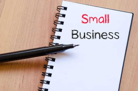Small business text concept write on notebook