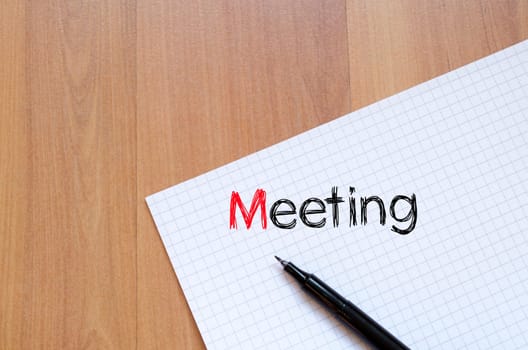 Meeting text concept write on notebook