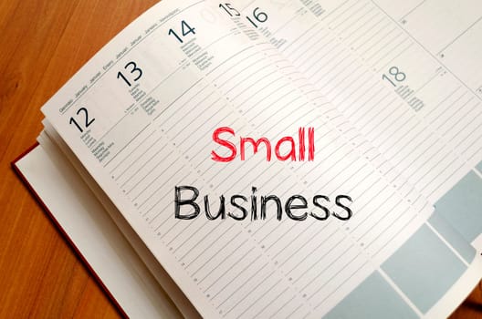 Small business text concept write on notebook