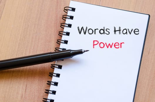 Words have power text concept write on notebook
