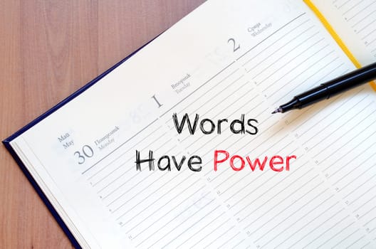 Words have power text concept write on notebook