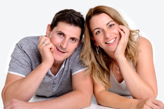 young beautiful couple in front of white background