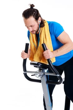 young man in blue shirt train with fitness machine and listening music