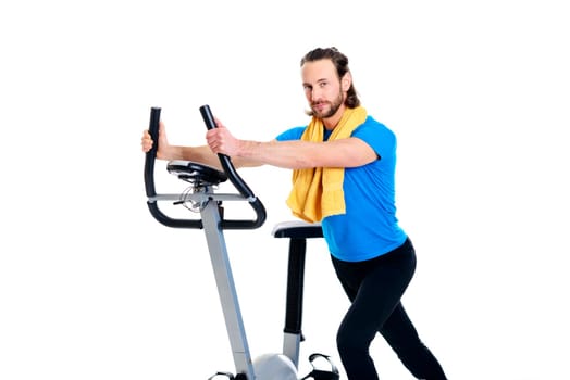 young man warming up for train with fitness machine