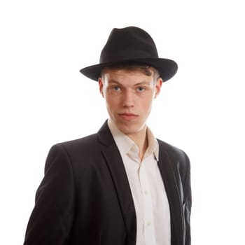 Young male performer in a jacket and wearing a fedora