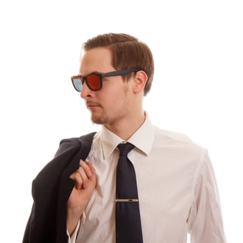 Man in a white shirt and a tie holding his jacket