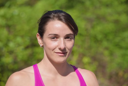 portrait of a young sporty woman in the countryside