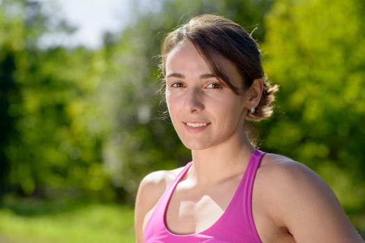 portrait of a young sporty woman in the countryside