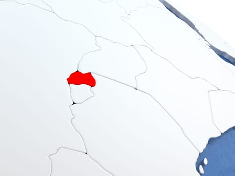 Map of Rwanda on globe with metallic land and realistic water. 3D illustration