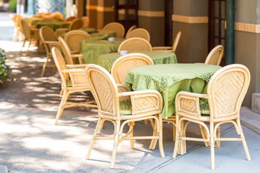 View of empty outdoor table of restaurant .
