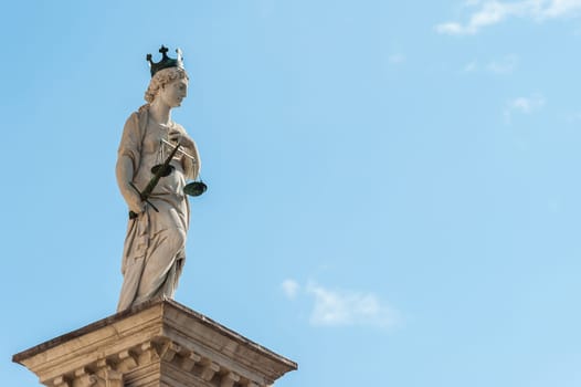 Statue of Justice, on the background of the sky